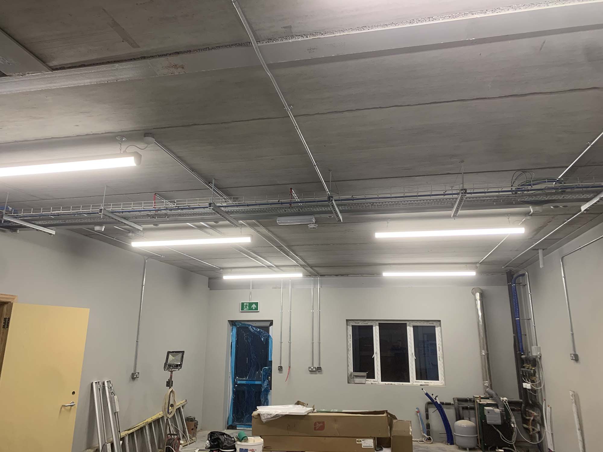 Metal brackets for lighting systems
