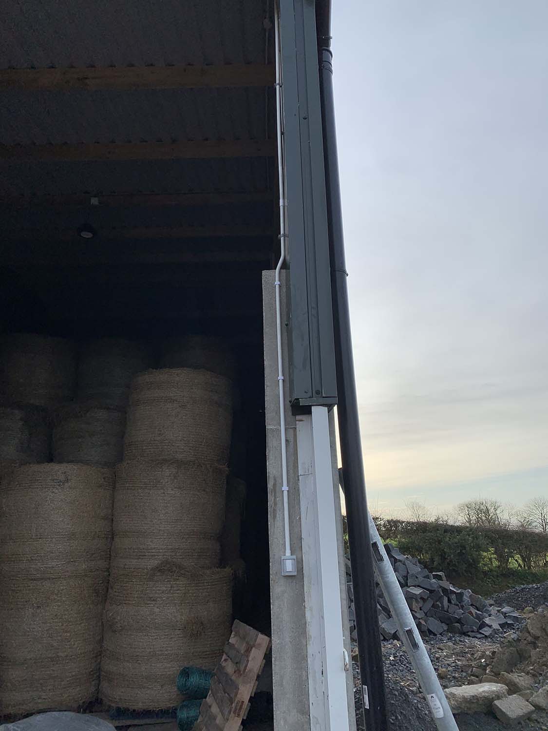 long installed light switch in farm building