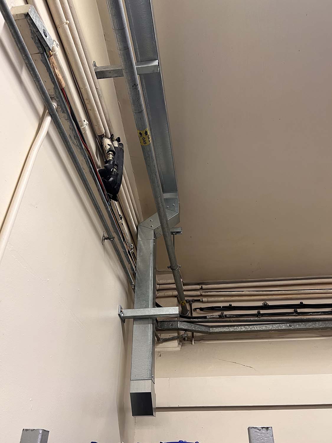 metal casing enclosing wiring of factory