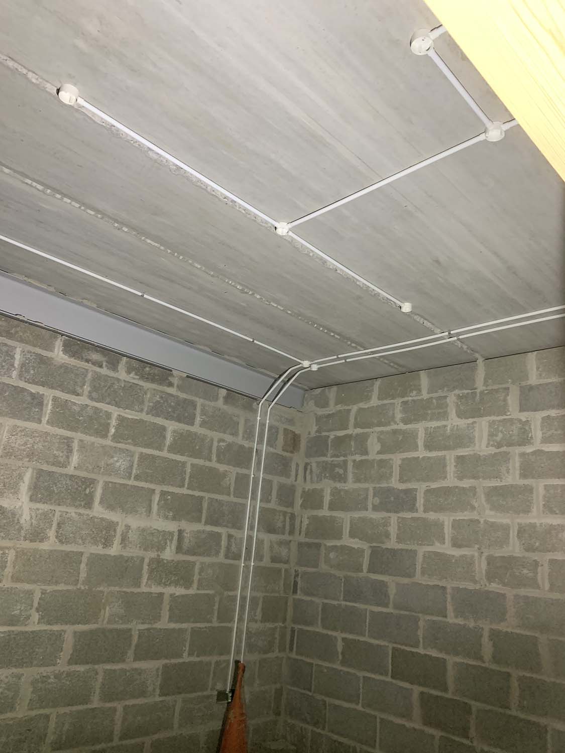overhead wiring system in white plastic