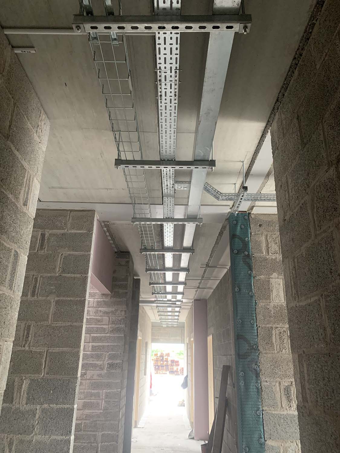 overhead metal casing enclosed wiring