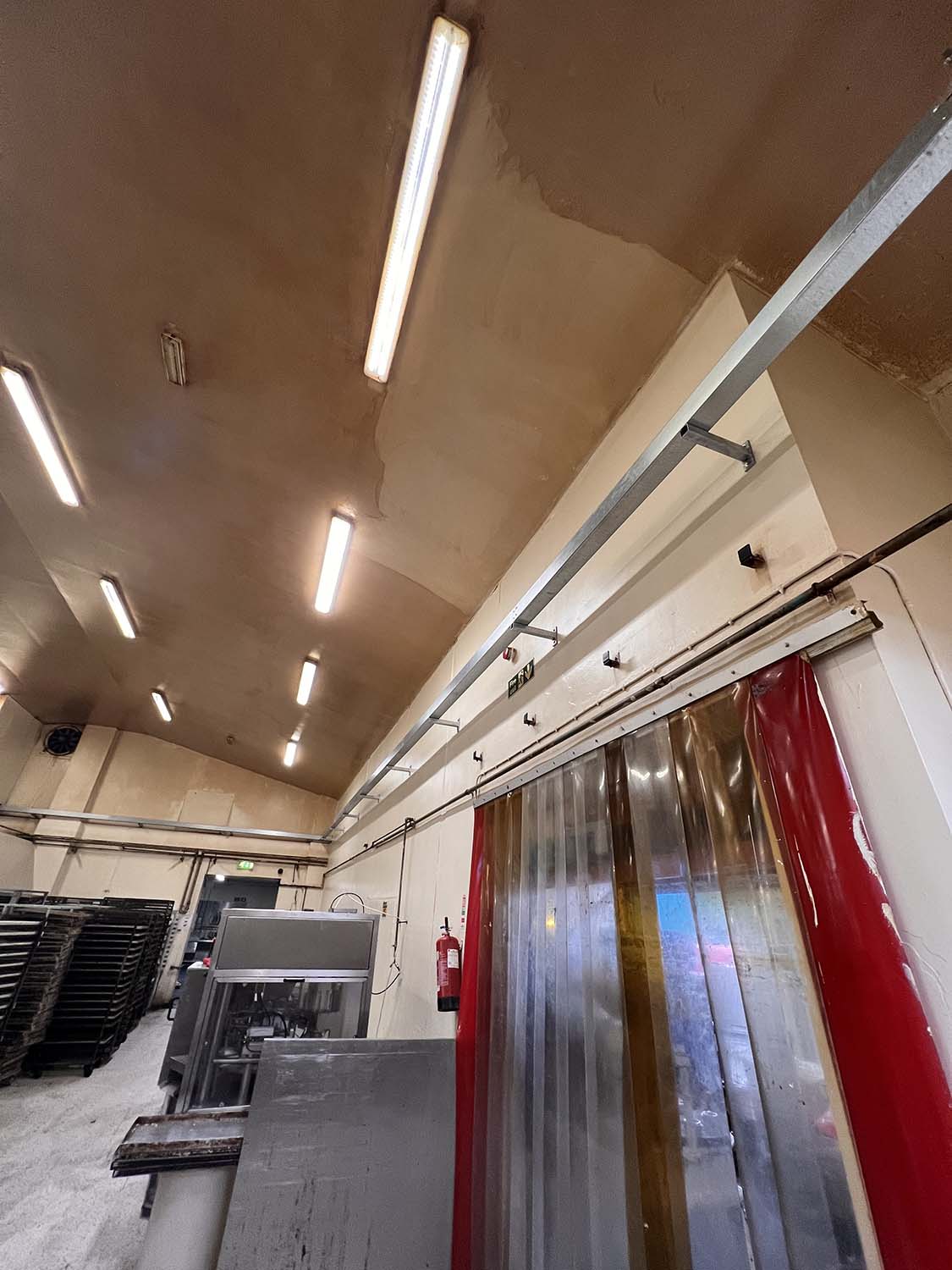 metal casing enclosing electrical wiring of factory